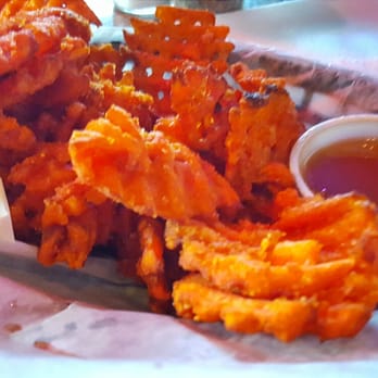 Lawrenceburger - Sweet potato fries with Carmel dipping sauce to share.  Best I've ever had this side of the Ohio. - American Near Me - Lawrenceburg, Indiana