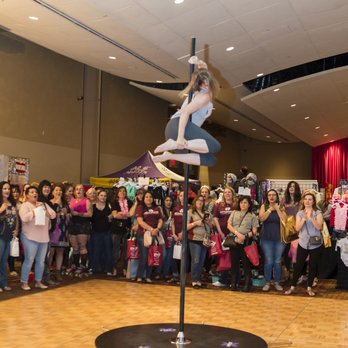 Bombshell Fitness - Instructor Kendra performing at the 13th Annual Girls Night Out event hosted by the Ronald McDonald Charities in NM - Pole Dancing Classes Near Me - Albuquerque, New Mexico