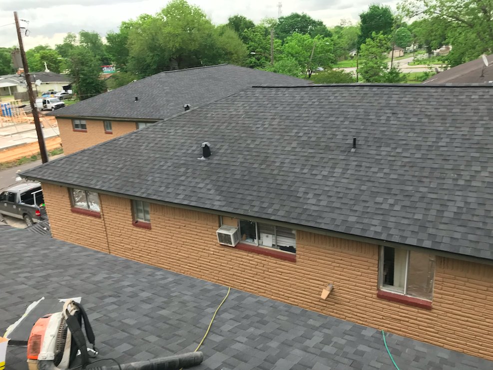 Slide of The Woodlands Premier Roofing