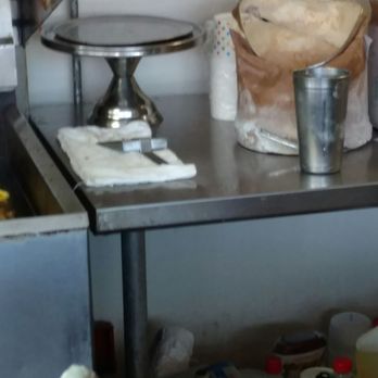 Emma Keys - Raw hamburger was being handled by the ungloved and unwashed hands of the same guy that was scooping out ice cream for shakes. - American Near Me - Greensboro, North Carolina
