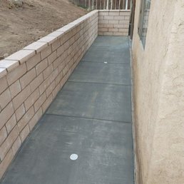 Retaining wall, drainage, and concrete work Retaining wall, drainage, and concrete work