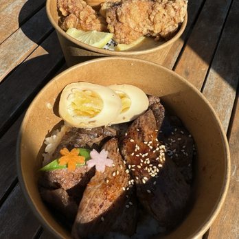 Nagomi Bento - Karaage fried chicken bento (back) and yakiniku-marinated BBQ beef bento (front) - Japanese Near Me - Somerville, Massachusetts Nagomi Bento - Karaage fried chicken bento (back) and yakiniku-marinated BBQ beef bento (front) - Japanese Near Me - Somerville, Massachusetts