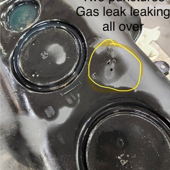 Audio Express - The two holes they punctured my gas tank with self tapping screws leaking gas everywhere while I was driving - Car Stereo Installation Near Me - Albuquerque, New Mexico