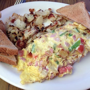 Monty's Grill - Omelette with ham green peppers tomato and onions. So good! - Diners Near Me - Royal Oak, Michigan