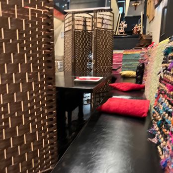 Ruby Of Siam - a long table with a basket on it - Thai Near Me - Highland Park, Illinois Ruby Of Siam - a long table with a basket on it - Thai Near Me - Highland Park, Illinois