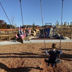 Exploration Park - Two swings, two slides.  Not enough for a park this big IMO.