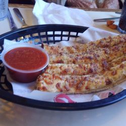 Pizza Hut - Awesome breadsticks with delicious pizza sauce for dipping.