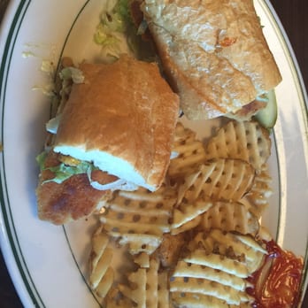 Malone's Bar & Grill - Fish sandwich with an upgrade to waffle fries! Yum! - New American Near Me - Maple Grove, Minnesota Malone's Bar & Grill - Fish sandwich with an upgrade to waffle fries! Yum! - New American Near Me - Maple Grove, Minnesota