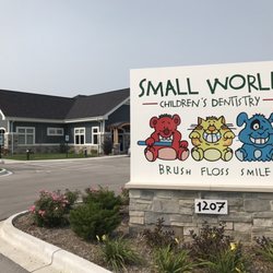 Small World Children's Dentistry - Sign and building