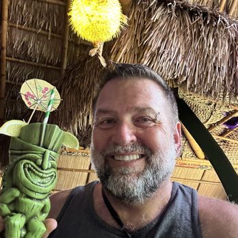 Bear Hair By Chuck - Enjoying a Tiki Drink on Kauai - Men's Hair Salons Near Me - San Diego, California Bear Hair By Chuck - Enjoying a Tiki Drink on Kauai - Men's Hair Salons Near Me - San Diego, California