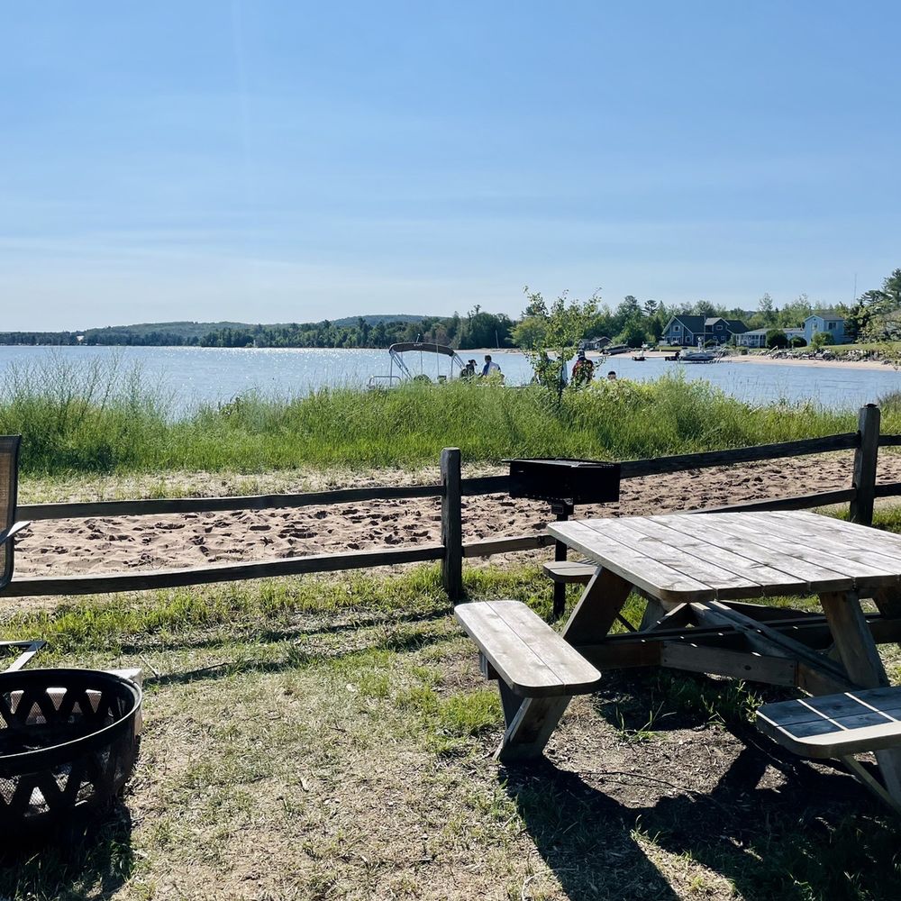 Paddler's Village - Our picnic table, fire pit and view. - Campgrounds Near Me - Christmas, Michigan Paddler's Village - Our picnic table, fire pit and view. - Campgrounds Near Me - Christmas, Michigan