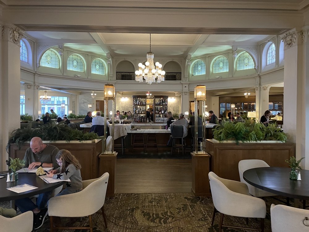 Main Dining Room at The Mount Washington Resort Logo