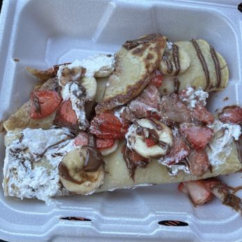 Broken Yolk Cafe - Banana, strawberry, Nutella and whip cream roll up crepes.  So BIG meal. - Breakfast & Brunch Near Me - Meridian, Idaho