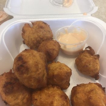 Conch Heaven - Conch fritters, don't remember how many I started off with, I ate a few before taking the picture. - Caribbean Near Me - Doraville, Georgia Conch Heaven - Conch fritters, don't remember how many I started off with, I ate a few before taking the picture. - Caribbean Near Me - Doraville, Georgia