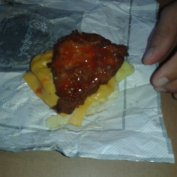 Chick-fil-A - This is what I paid $7 for. A small chicken, hard biscuit that would Crack your teeth with cold cheese.  Worst place ever - Fast Food Near Me - Schertz, Texas