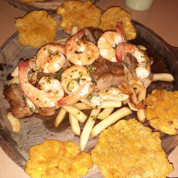 Maracaibo Bistro - Lomito Neptuno - Steak with Shrimp. Tostones that can't be beat. - Venezuelan Near Me - Virginia Beach, Virginia Maracaibo Bistro - Lomito Neptuno - Steak with Shrimp. Tostones that can't be beat. - Venezuelan Near Me - Virginia Beach, Virginia