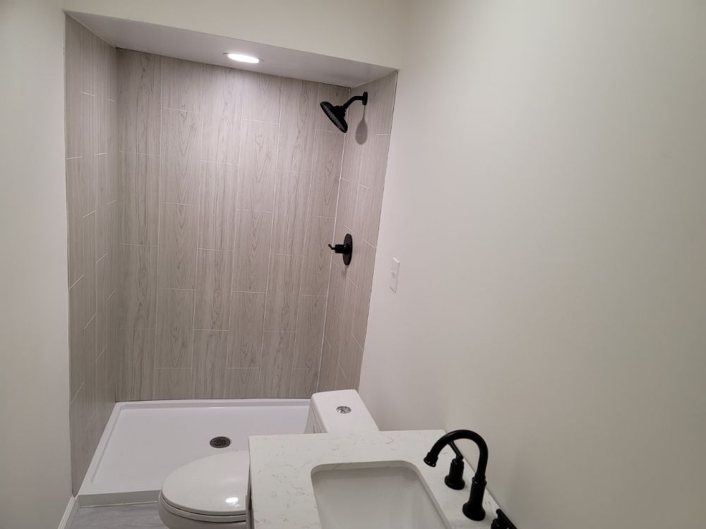 Slide of Powers Up Electrical & Plumbing