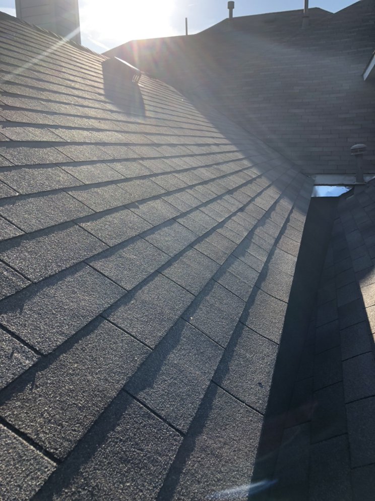 Slide of Osman Roofing Company