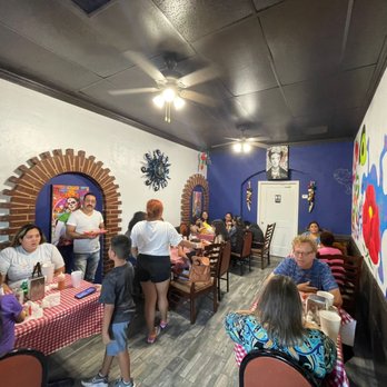 Mami Coco - a group of people sitting at tables in a restaurant - Tacos Near Me - Dallas, Texas Mami Coco - a group of people sitting at tables in a restaurant - Tacos Near Me - Dallas, Texas