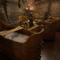Pivní lázně Bernard - A room of 3 tubs in a faux grotto setting