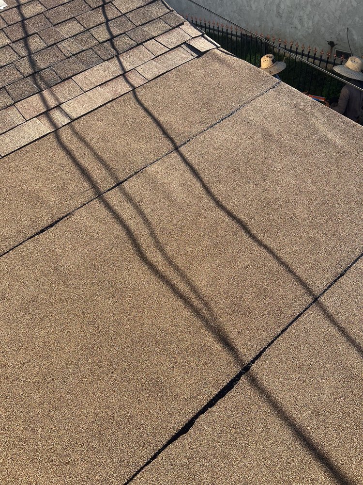 Slide of Alpha Roofing Group