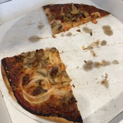Luigi's Pizza - Mushroom and onion with half Ezzo pepperoni other half Ezzo sausage pizza.