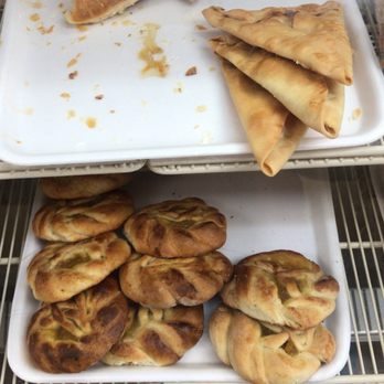 Pinolandia - a variety of pastries in a display case - Nicaraguan Near Me - Miami, Florida Pinolandia - a variety of pastries in a display case - Nicaraguan Near Me - Miami, Florida