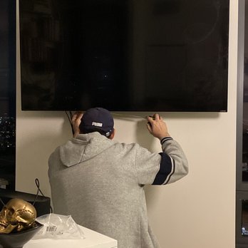 Brooklyn Tv Guys - Audrey adding the finishing touches. - Home Theatre Installation Near Me - Brooklyn, New York Brooklyn Tv Guys - Audrey adding the finishing touches. - Home Theatre Installation Near Me - Brooklyn, New York