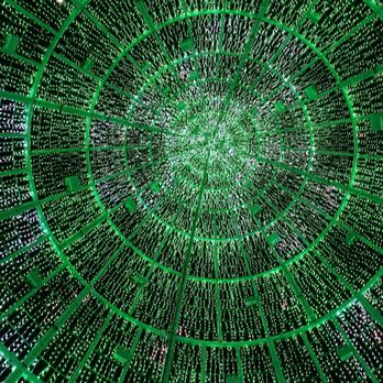 Denver Christkindlmarket - We arrived at the market, and we were greeted by a massive Christmas tree made up of twinkling LED lights that were synchronized to music. - Public Markets Near Me - Denver, Colorado