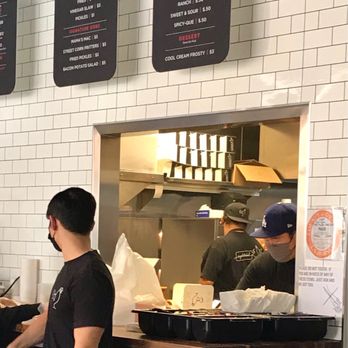 Cluck Kitchen - Looking into the kitchen - Chicken Shop Near Me - Irvine, California Cluck Kitchen - Looking into the kitchen - Chicken Shop Near Me - Irvine, California