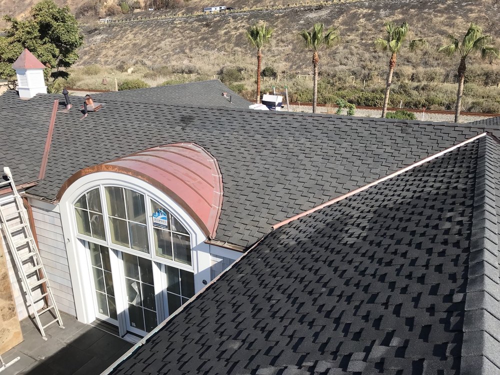 Slide of Aztec Roofing