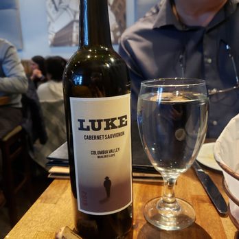 Da Vinci Ristorante - a bottle of wine and a glass - Pizza Near Me - Waltham, Massachusetts