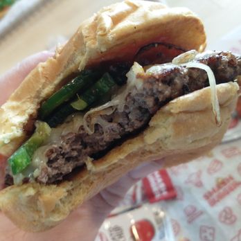 Smashburger - Bitten burger and juicy. - Burgers Near Me - Orland Park, Illinois Smashburger - Bitten burger and juicy. - Burgers Near Me - Orland Park, Illinois