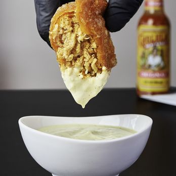 Mary Jane’s Kitchen - Buffalo Chicken Pastelillo dipped in our Poblano Avocado Ranch - Italian Near Me - Reading, Pennsylvania Mary Jane’s Kitchen - Buffalo Chicken Pastelillo dipped in our Poblano Avocado Ranch - Italian Near Me - Reading, Pennsylvania
