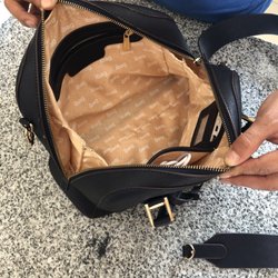 Nine West - Clean. Like new condition. The clip failure was not anticipated. The customer service was pathetic.