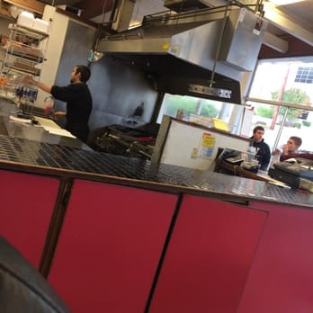 Broiler Bay - Kitchen where they broil their stuff live. - Burgers Near Me - Bellevue, Washington Broiler Bay - Kitchen where they broil their stuff live. - Burgers Near Me - Bellevue, Washington