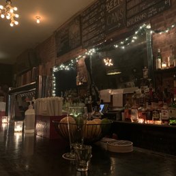 a glass of wine on the bar