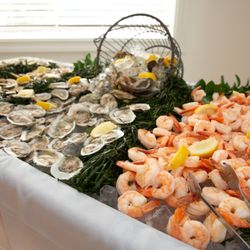 The Fruited Plain Caterers - Oyster and shrimp display at a White Meadow Lake event, beautifully captured by Jeffrey Vreeland