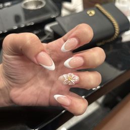 Gorgeous nails!! Staff was very friendly I would highly recommend getting your nails done here :) Gorgeous nails!! Staff was very friendly I would highly recommend getting your nails done here :)