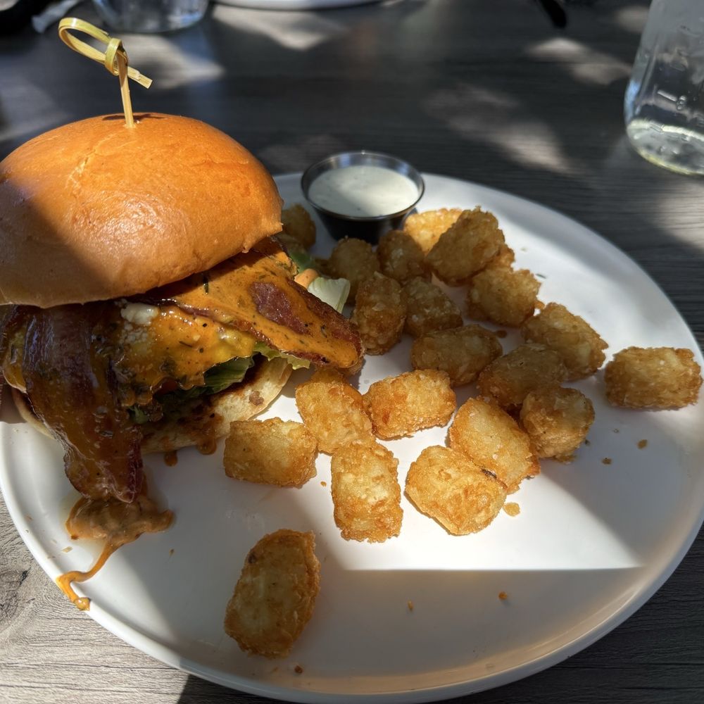 Cook’d - Tahoe burger with tots (plus the 50 cent ranch dressing that they offer but don't tell you they're charging you for). - American Near Me - Reno, Nevada