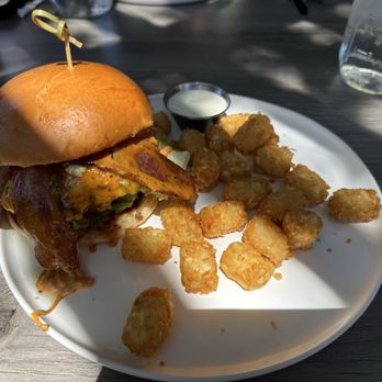 Cook’d - Tahoe burger with tots (plus the 50 cent ranch dressing that they offer but don't tell you they're charging you for). - American Near Me - Reno, Nevada Cook’d - Tahoe burger with tots (plus the 50 cent ranch dressing that they offer but don't tell you they're charging you for). - American Near Me - Reno, Nevada