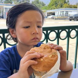 My son enjoying his burger