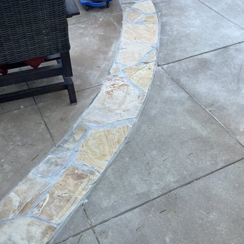Allans Pool Service - New stone added to line what was an uneven and not level concrete seam. - Pool Cleaners Near Me