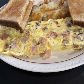Landmark Family Restaurant - Meat lovers omelette, added cheese - American Near Me - Milwaukee, Wisconsin Landmark Family Restaurant - Meat lovers omelette, added cheese - American Near Me - Milwaukee, Wisconsin