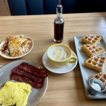 Maple & Yolk - M&Y Combo comes with scrambled eggs, turkey bacon and waffles. Added hash browns and a caramel macchiato - Breakfast & Brunch Near Me - Urbana, Illinois Maple & Yolk - M&Y Combo comes with scrambled eggs, turkey bacon and waffles. Added hash browns and a caramel macchiato - Breakfast & Brunch Near Me - Urbana, Illinois