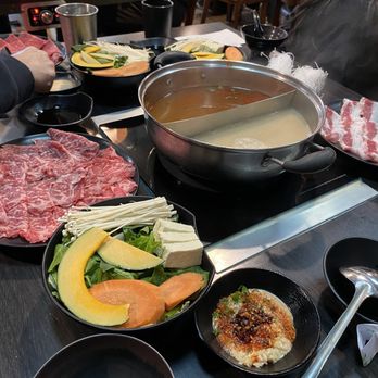 Shabu Time - tom yum and non spicy tonkotsu soup with veggies, kobe, angus, beef belly, and shack sauce - Japanese Near Me - San Jose, California Shabu Time - tom yum and non spicy tonkotsu soup with veggies, kobe, angus, beef belly, and shack sauce - Japanese Near Me - San Jose, California