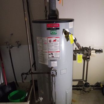 Paradise Plumbing & Drain - Leaking out of the bottom....Time to replace. - Plumbing Near Me Paradise Plumbing & Drain - Leaking out of the bottom....Time to replace. - Plumbing Near Me