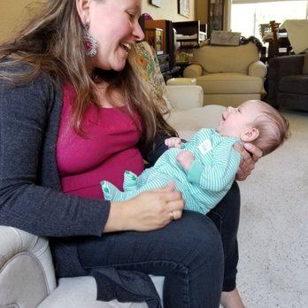 Renata Provost - Renata doing a home visit to provide postpartum support. - Doulas Near Me Renata Provost - Renata doing a home visit to provide postpartum support. - Doulas Near Me