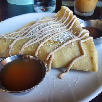 Rooster - Downtown - Roasted apple crepe served with caramel sauce - Creperies Near Me - St. Louis, Missouri Rooster - Downtown - Roasted apple crepe served with caramel sauce - Creperies Near Me - St. Louis, Missouri