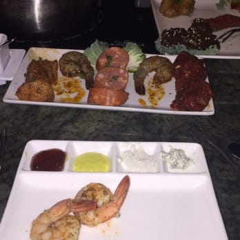 The Melting Pot - Dipping sauces for each option, unprepared food to cook - Fondue Near Me - Columbus, Ohio The Melting Pot - Dipping sauces for each option, unprepared food to cook - Fondue Near Me - Columbus, Ohio